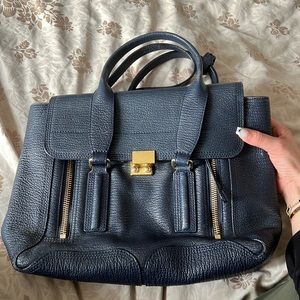 100% leather Philip lil bag. Medium sized